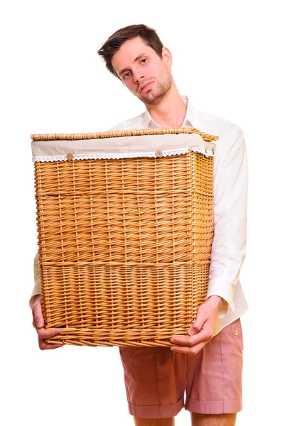 Young man holding a large flasket — Stock Photo, Image
