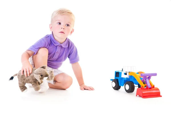 Pojke med leksaker — Stockfoto