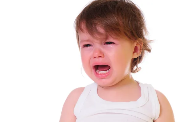 小さな子供が泣いています。 ストック写真