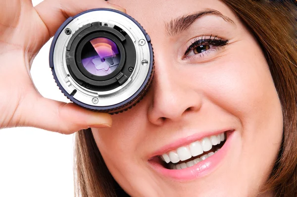 Mulher jovem com uma lente — Fotografia de Stock