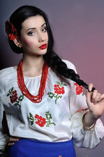 stock image Studio portrait of the beautiful young lady wearing Ukrainian c