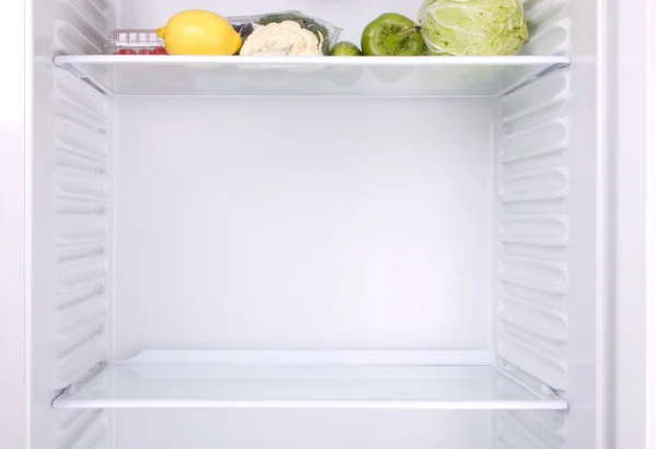Полупустой холодильник — стоковое фото
