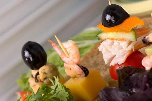 Canapés with seafood 스톡 이미지