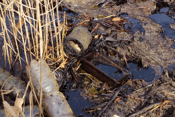 stock image Oil and plastic bottle pollution