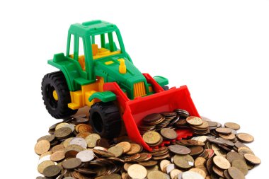 Gree bulldozer raked pile of coins clipart