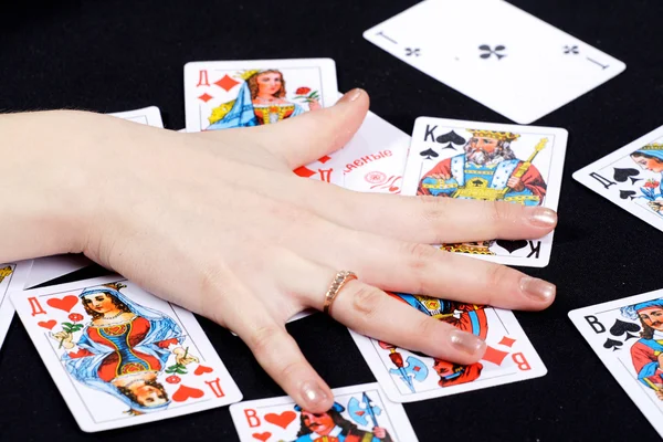 Palm on playing cards — Stock Photo, Image