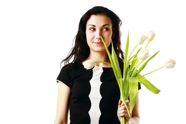 Mutlu bir kadın tutarak çiçekler — Stok fotoğraf