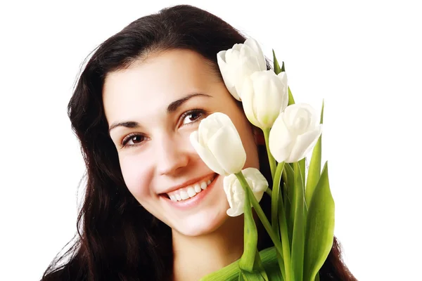 Happy woman holding flowers — Stock Photo, Image