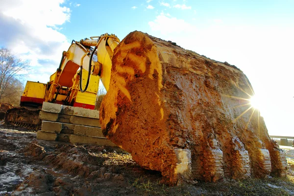 stock image Excavator working at construction site