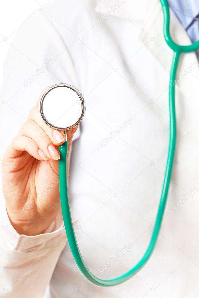 Stethoscope in doctor's hand
