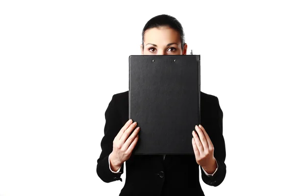 Business woman hiding face behind black folder — Stock Photo, Image