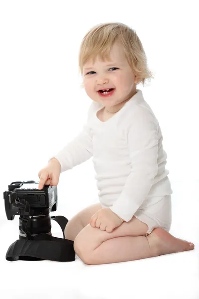 Laughing baby met camera geïsoleerd op wit — Stockfoto