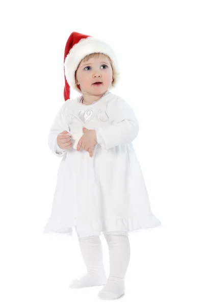 Niedliches Baby mit Weihnachtsmütze — Stockfoto