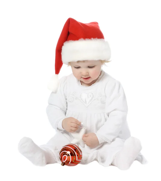 Noel Baba şapkalı şirin bebek. — Stok fotoğraf