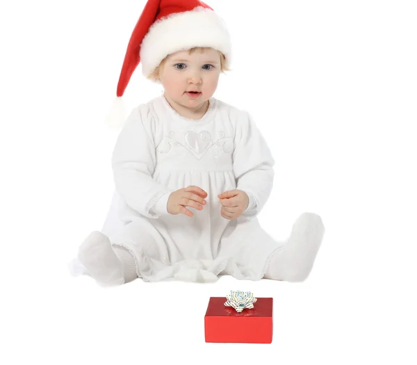 Noel Baba şapkalı şirin bebek. — Stok fotoğraf