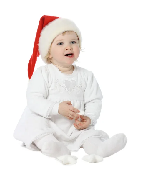 Niedliches Baby im Weihnachtsmann — Stockfoto