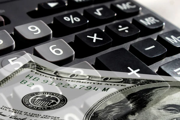 Kalkulačka s penězi — Stock fotografie