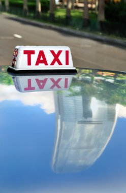 Taxi & Skyscraper Reflection, Hong Kong clipart