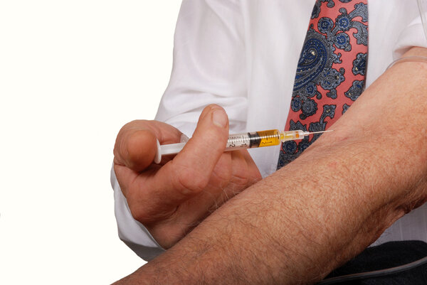 Business man injecting drugs