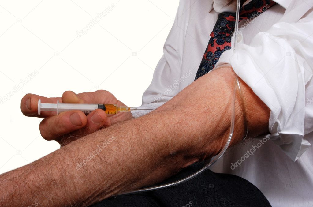 Businessman injecting drugs