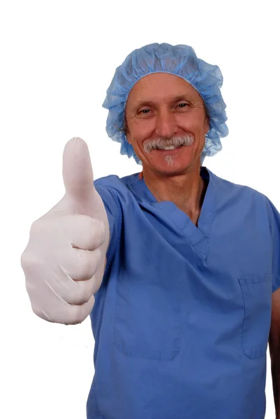 Surgeon giving 'thumbs up' — Stockfoto