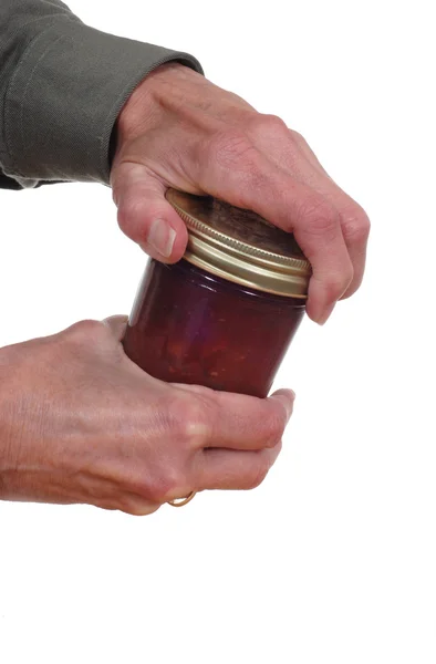 Mãos abrindo um jarro — Fotografia de Stock