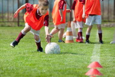 Boy on the sports field clipart