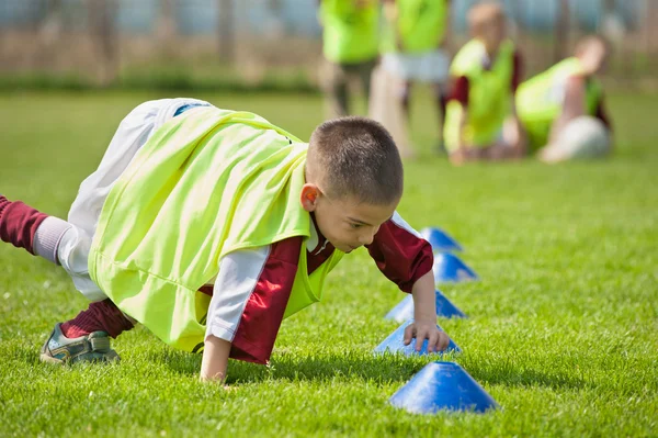 Boy on the sports field — Stock Photo, Image