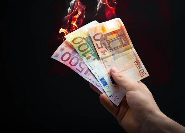Poltetaan euroa — kuvapankkivalokuva