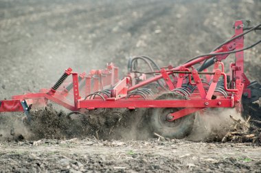 Preparing the soil in the field clipart