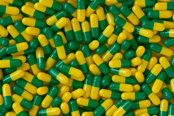 Tobolka pilulek pozadí — Stock fotografie
