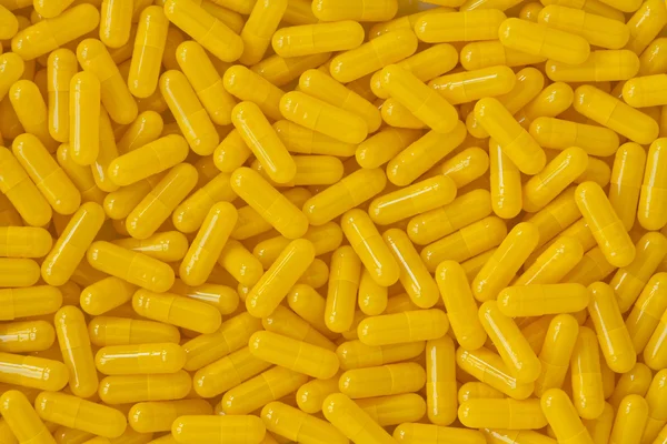 Kapszula tabletták háttér — Stock Fotó