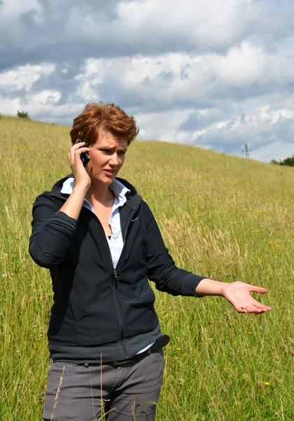 stock image Young woman is calling