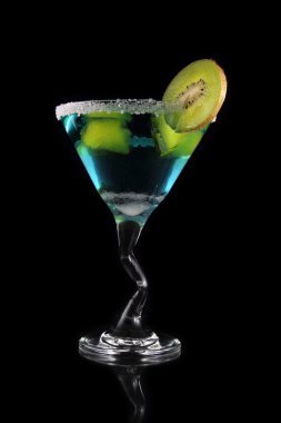 Blue martini drink with kiwi and yellow ice clipart