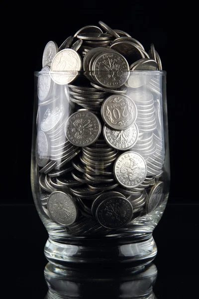 Coins in glass — Stock Photo, Image
