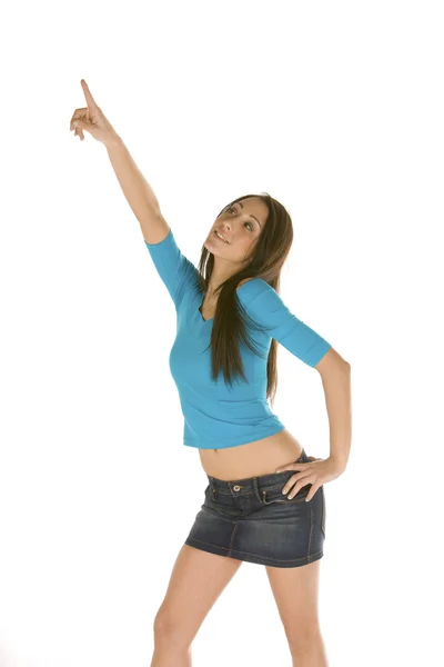 Młoda kobieta wskazując palcem wysokiej — Zdjęcie stockowe