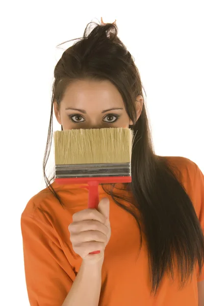 Mujer joven sosteniendo cepillo aislado en blanco —  Fotos de Stock