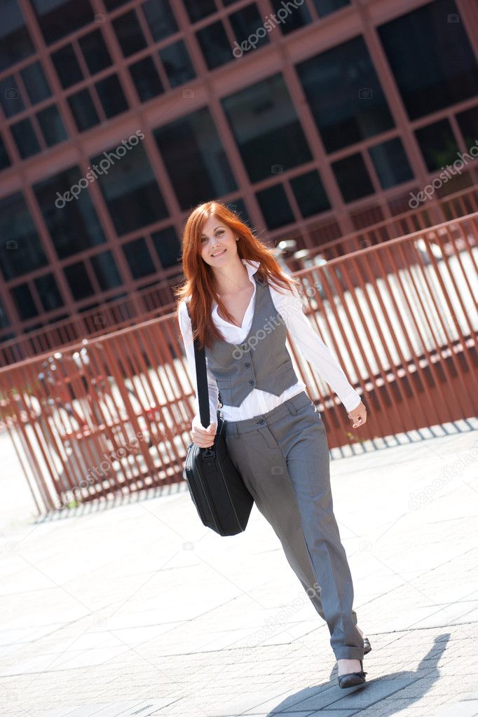 Businesswoman walking outdoors