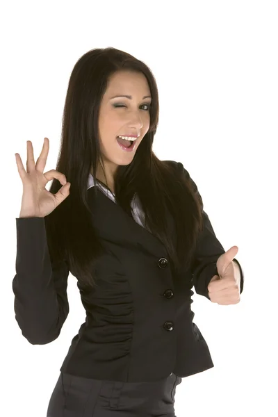 Young businesswoman with thumb up and ok sign — Stock Photo, Image