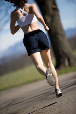 Young woman running clipart