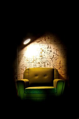 Alone chair in dark room clipart