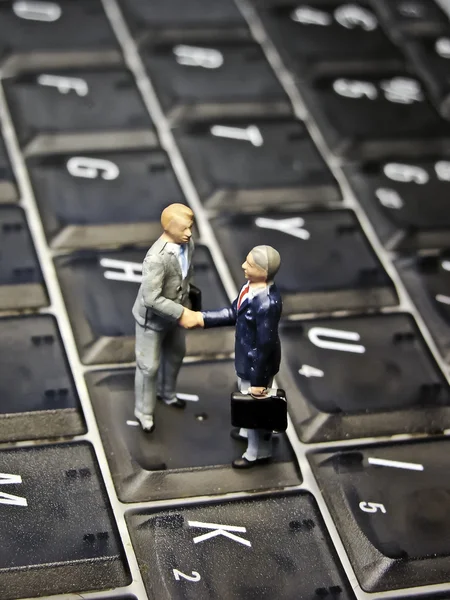 Miniatyr tangentbord handslag — Stockfoto
