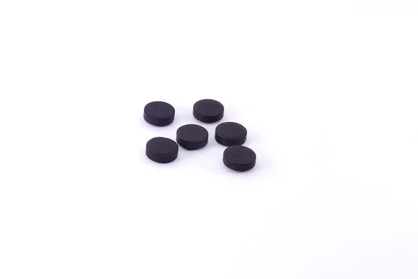 Zwarte pillen — Stockfoto