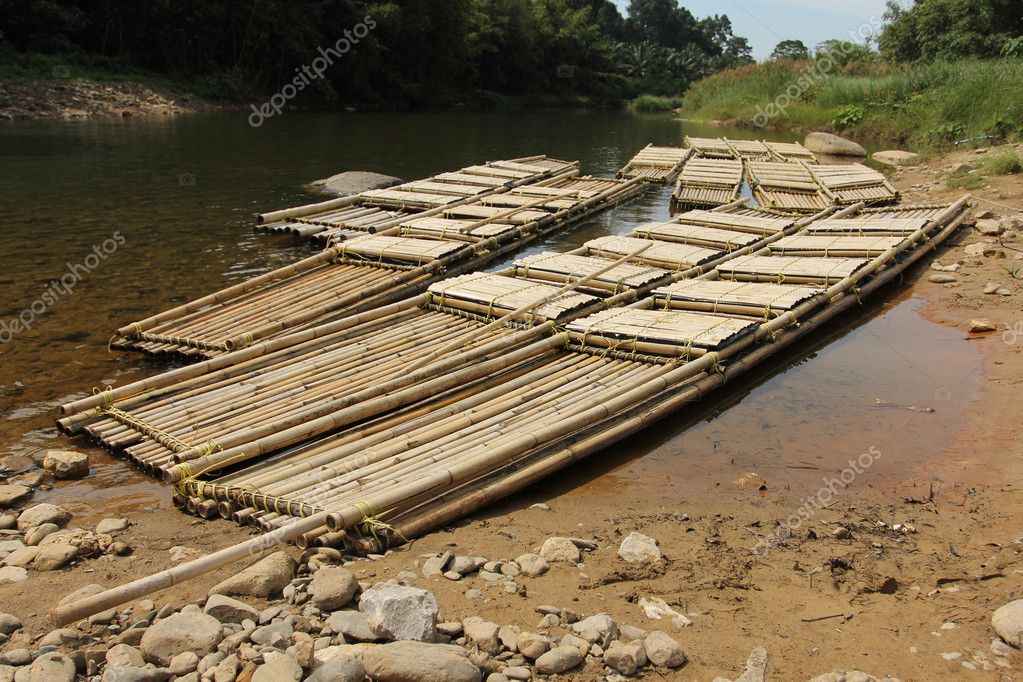 Bamboo raft floating in river – Stock Editorial Photo © parkportrait ...