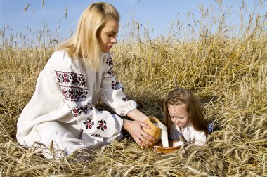 Woman watered the child clipart