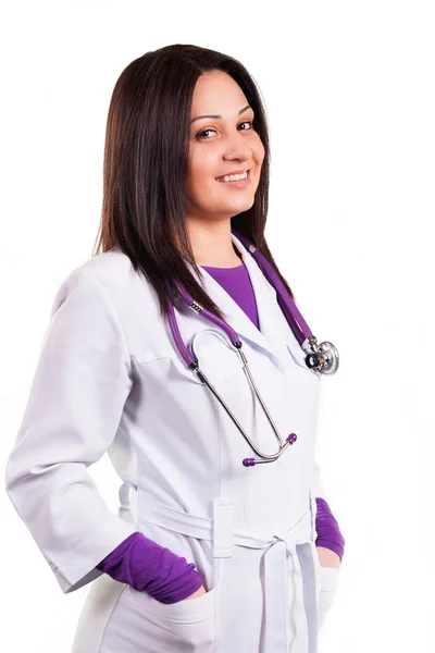 Young caring doctor or health care worker in white uniform, with — Stock Photo, Image