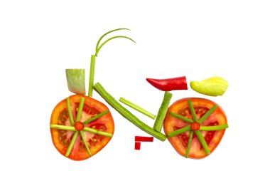 Bicycle made ​​from fruits and vegetables .