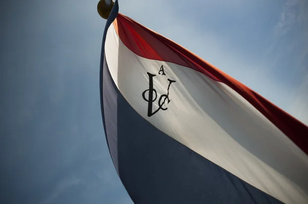 Dutch VOC flag against sun — Stock Photo, Image