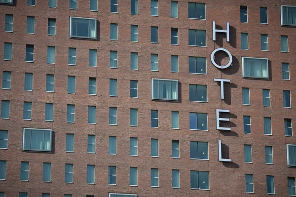 Hotel neon zewnętrzny znak — Zdjęcie stockowe
