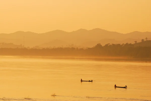 Zonsondergang op de mekong rivier Rechtenvrije Stockfoto's